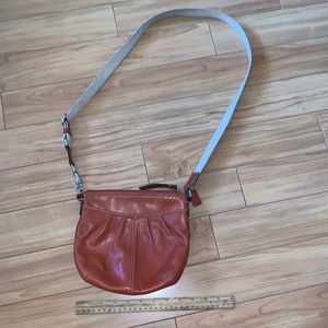 Leather Coach orange crossbody bag